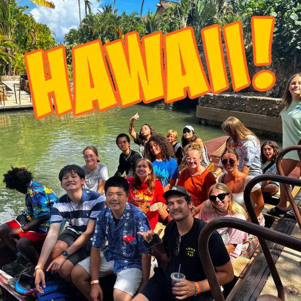 Campers enjoying a boat ride around the world-famous Polynesian Cultural Center
